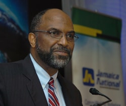 Earl Jarrett, General Manager, Jamaica National Building Society addresses members during the 140th Annual General Meeting held at the Jamaica Pegasus Hotel in Kingston, July 23.  