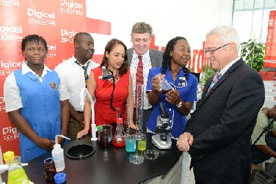 Digicel Foundation launched their Innovations in Science Education project on Thursday, September 25, 2014 at the telecommunications giant headquarters in Downtown. Experimenting with the lab are (L-R): Patrece Campbell of Meryl Groove High, Carees Stephenson of Kingston High,  CEO of Digicel Foundation Samantha Chantrelle, CEO of Digicel Barry O’Brien, Tonia Williams of Immaculate High School and Minister of Education the Honourable Reverend Ronald Thwaites.