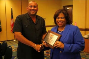 New CTO chairman, Richard Sealy, congratulated by his immediate predecessor, USVI commissioner of tourism, Beverly Nicholson-Doty