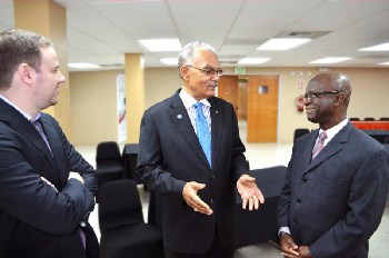 Global Innovation Business Corporation team members Dr. Basil Springer (center), Dr. Owen Carryl (right) and Diego Bolson Ruzzarin chat before last week's launch of the "Caribbean Food Business Innovation Revolution" in Port-of-Spain, Trinidad. The global initiative aims to transform the Caribbean's food and beverage industry.