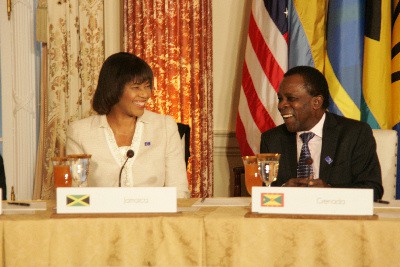 Jamaica’s Prime Minister, the Hon. Portia Simpson-Miller shares a light moment with the Prime Minister of Grenada, Dr. Keith Mitchell at the Caribbean Energy Security Summit held at the US State Department on Monday, January 26, 2015. (Photo credit Derrick Scott)
