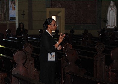 Dr. Sheila McDonald Harleston, directing the dispersed choir