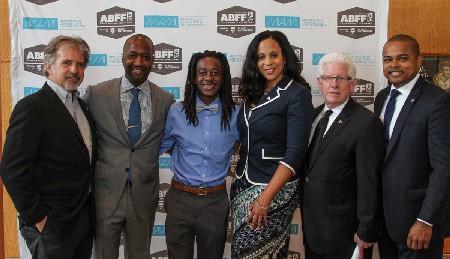 ABFF Returns to Miami: L-R: Bruce Orosz, GMCVB Chair; Jeff Friday, Founder American Black Film Festival (ABFF); Elijah Wells, ABFF Community Showcase winner and Overtown Miami filmmaker; Connie Kinnard , GMCVB Vice President Multicultural Tourism and Development; William Talbert, GMCVB President and CEO; and City of Miami Commissioner Keon Hardemon.  Photo by ExclusiveAccess.Net