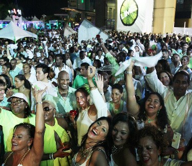 Party-goers embodying the Carnival spirit at Hyatt Regency’s white with a hint of LIME fete
