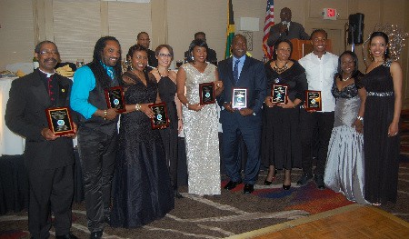 : Foreign Affairs and Foreign Trade Minister Senator Kamina  Johnson-Smith fourth from left, shares the spotlight with recipients of the inaugural Talawah awards from left to right Rev Canon Calvin McIntire , Ed Robinson us congress Yvette Clarke, Raxann Chin, Devon Harris  Rev Dr. Jacqueline McCullough, Micheal Seton, Diaspora Advisory Board member Joan Pinnock and Diaspora feature leader Erin Lue-Hing the awards were presented on saturday June 11 at the Northeast United States Diaspora Gala, at the JFK Hilton Hotel, Queens New York.  Photo Credit: Derrick Scott    