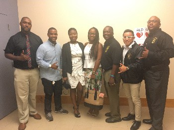 Women’s Empowerment Circle Co-Founder’s Lashonya Rogers and Ashley Montgomery (center) along with Alpha Phi Alpha Fraternity, Inc. members (peripheral) Sean Hairston, Victor Andrews, Christopher Stevenson, Gerson Sanchez, and Bryan Jones at the conclusion of the event.