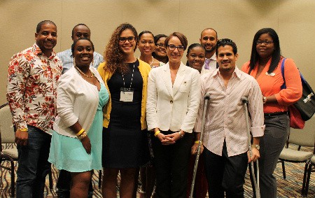 Jamaica's Minister of Foreign Affairs and Foreign Trade, Senator the Hon. Kamina Johnson Smith (center, second right) sharing the camera lens with millennials of Jamaican descent who participated in the recent Diaspora Summit and Gala in Orlando (June 24 - 26). 
