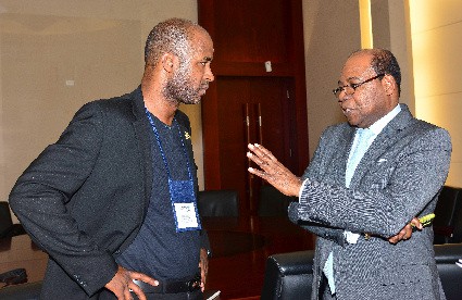 Minister of Tourism, Hon. Edmund Bartlett (right) speaks with Douglas E. Gordon, producer of Canex Jamaica, the first cannabis-centred conference on the business potential of the marijuana trade. The Minister delivered the opening address at the event which was held from September 2 - 3 at the Montego Bay Convention Centre. 