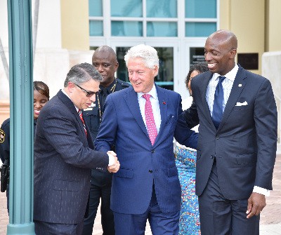President Bill Clinton (center), Miramar Mayor Wayne Messam (Right)  and Member of Clergy (left)  Photo credit: Gregory F. Reed
