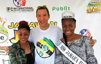 Double Olympic Champion, Elaine Thompson (left) with International Freight Consolidators CEO John Collins and Miss Jamaica Florida Teen Shanna Francis at the Grace Jamaican Jerk Festival