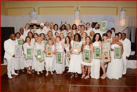 Top 50 bookers pose with JTB Chairman John Lynch (back left) and Tourism Director Paul Pennicook (far right) at the JTB’s “All White Affair” in Montego Bay 