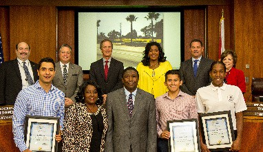 Commissioner Holness, Broward County commissioners, and Turner Construction Company staff members with their certificates.