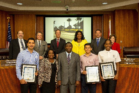 Commissioner Holness, (First row, center) Broward County commissioners, and  Turner Construction  Company staff members with their certificates.