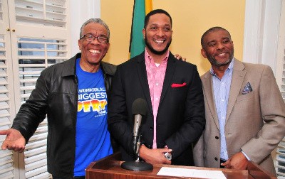 Richard Lue, Wayne Miller, Eddy Edwards making the announcement New Home for Grace Jamaican Jerk Festival DC