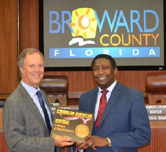 Book on Caribbean-American Achievers Presented To Broward Commission