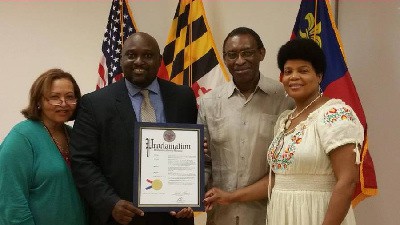 Jewel Bazilio-Bellegarde, Daniel Koroma, Serge Bellegarde and Carline Brice-Mesilus celebrate HavServe's "Non-profit of the Year" honor at the National Caribbean American Heritage Month in Montgomery County, MD.