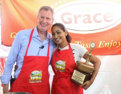 Jamaica’s Lisa Hanna Wins Grace Jamaican Jerk Festival Celebrity Quick Fire Challenge Trophy against Two-Time Champ, NY Mayor Bill de Blasio