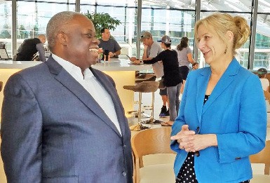 Quotable Caribbean: Kim Day, CEO of Denver International Airport (right), chats with U.S. Virgin Islands Governor Kenneth E. Mapp in Denver last week.