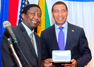 Commissioner Dale Holness and Prime Minister Andrew Holness receiving Keys To The City