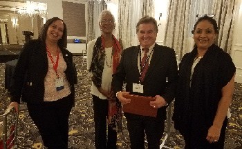 Sally Yearwood, Gail Mathurin, Francisco Santeiro , Marilyn Ramkissoon the 41st annual Conference on the Caribbean and Central America discussing Disaster resilience planning