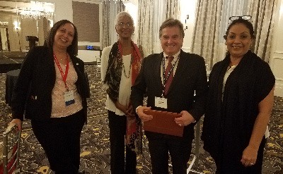 Sally Yearwood, Gail Mathurin, Francisco Santeiro , Marilyn Ramkissoon the 41st annual Conference on the Caribbean and Central America talking Disaster resilience planning
