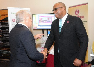 Christopher Denny, Vice President, Service and Sales Support , Victoria Mutual Building Society and Howard Berger, at Jamaica USA Chamber of Commerce Biz Expo