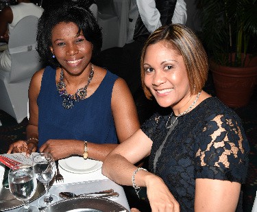 Marie Stewart Lewin, senior manager, JN Group, and Leesa Kow, executive, JN Group, were among their team representatives at the Jamaica Observer Business Leader Awards