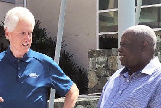 Former United States President Bill Clinton (left) meets with Governor Kenneth Mapp on Monday in the ﻿U.S. Virgin Islands