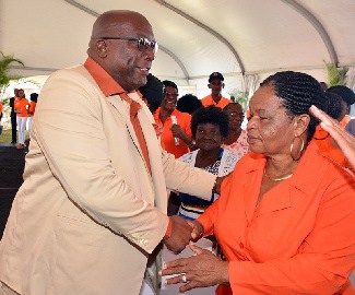 Hon. Dr. Timothy Harris greeting supporters at the PLP Convention