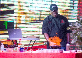 Chef Irie Spice doing a live cooking demo at Taste The Islands Experience 2018