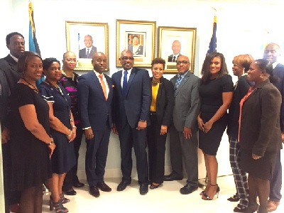 At center, Bahamas Prime Minister, the Honourable Hubert Minnis at opening of new location of Bahamas Consulate General Miami, with members  of the staff of The Bahamas Consulate General, Miami and to his left, The Bahamas Minister of Foreign Affairs, the Honourable Darren Henfield.