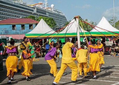 Jamaica's Minister of Tourism takes Jamaican Culture such as The Mahogany Montego Bay Dance Troupe dancers to Cruise Passengers