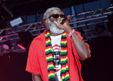 Ras Baba of Code Red Band performing at the Grace Jamaican Jerk Festival