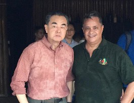 The State Councilor and Minister of Foreign Affairs of the People’s Republic of China, Wang Yi with Roraima CEO Capt. Gerry Gouveia at Arrowpoint Nature Resort in Guyana.