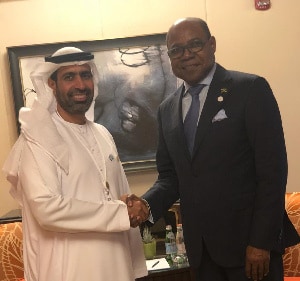 Minister of Tourism, Hon Edmund Bartlett (R), shakes hands with His Excellency Sultan Mohammed Al Shamsi, following discussions to strengthen tourism relations between Jamaica and the UAE. 