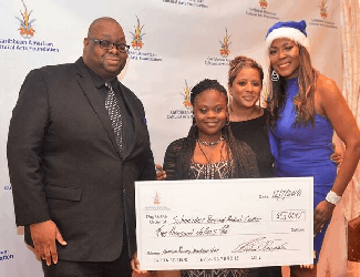 Michael Thomas, Sherla Sealey, Chaun Bunt, Renee Knorr Caribbean American Cultural Arts Foundation Donates a Five Thousand Dollar Holiday Gift