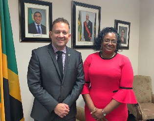Jamaica's Consul General Hon. Oliver Mair with Rev Dr Coretta Mathie