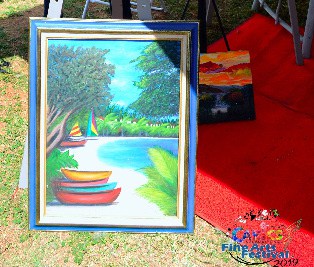 Paintings by Jamaican/Trinidadian Elizabeth Toby, shown at the March 9 CARICS International Fine Arts Festival in Montego Bay.