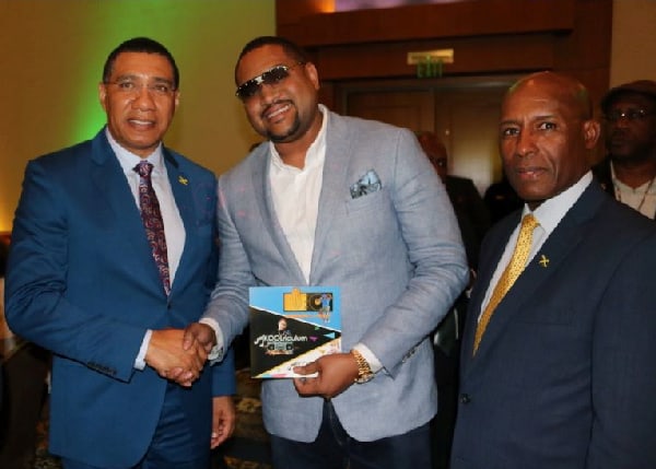  Prime Minister, Most Hon Andrew Holness greets multi-platinum Grammy nominee, music producer and founder of DA Gap Movement, Dr. Kevin Capes, at the Jamaica Chamber of Commerce of Atlanta’s Inaugural Awards and Banquet 