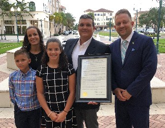 Jamaica’s Consul General R. Oliver Mair (right) with Mr. Andrew Seaga (second right) and his family.