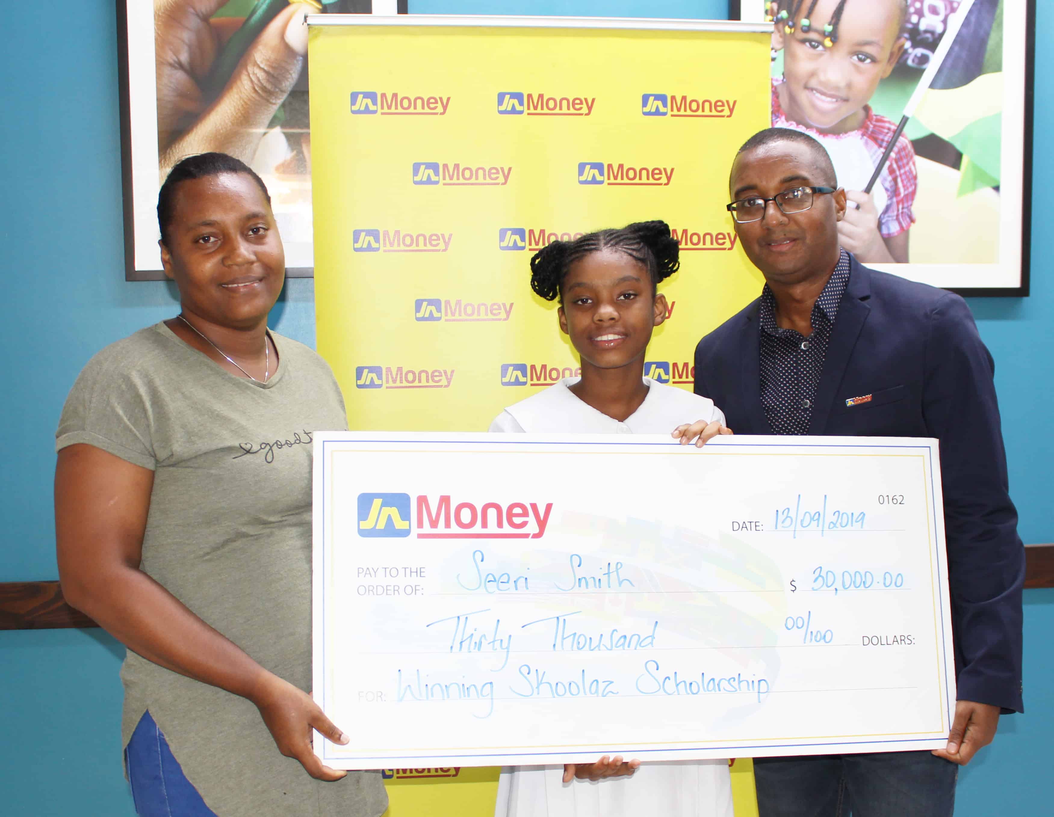 Students in Jamaica receive scholarships from JN Money with Horace Hines