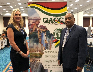 FDA’s Kim Prenter with Guyanese American Chamber of Commerce (GACC) president Wesley Kirton at the chamber’s booth at the Florida International Trade Conference and Expo (FITCE 2019).