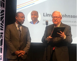 Senior Bahamas Tourism Executive, Linville Johnson Receives Recognition Award from Dr. Harry Schmidt Religious Conference Management Association