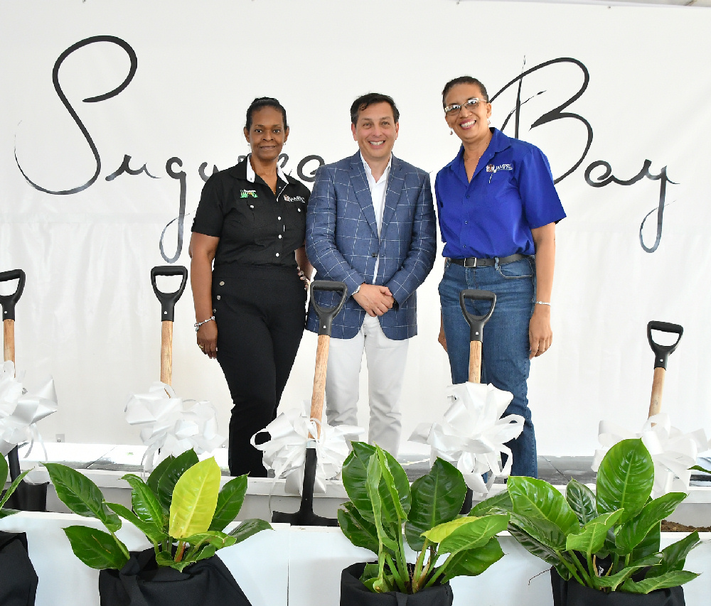JAMPRO representatives Gail Barrett, Manager of Project Implementation (left) and Carol Straw, Manager of Tourism and Services (right) pose with Ruben Becerra, Vice President of Corporate Affairs & Business Development Karisma Hotels and Resorts Corporation, at the groundbreaking of the Sugarcane Bay tourism development being led by Karisma.