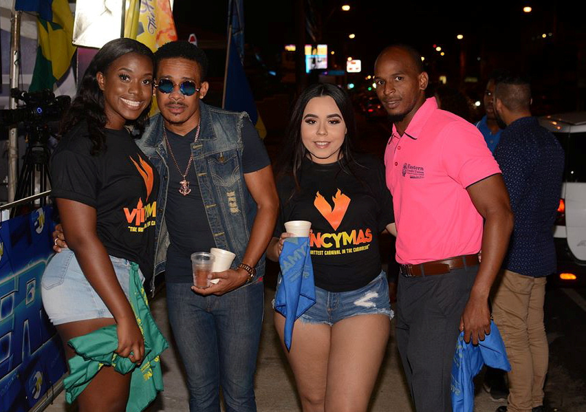 Vincymas brand ambassadors pose with attendees at the recent event 