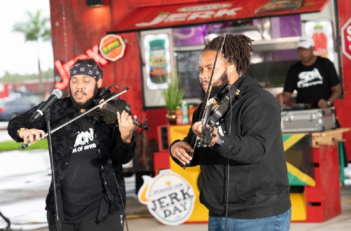 Violinists Sons of Maestro perform for Inaugural National Jamaican Jerk Day