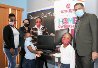 Victoria Mutual Donates Computers to Parkway Wee Care School in Miami Gardens