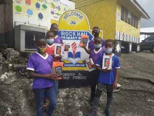 Jamaican Students Receive Computer Devices Donated by the Diaspora - Rock Hall All Age 