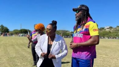 Minister Babsy Grange and Chris Gayle
