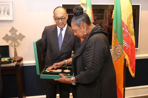 Prince Ermias Sahle-Selassie and Minister Olivia Grange